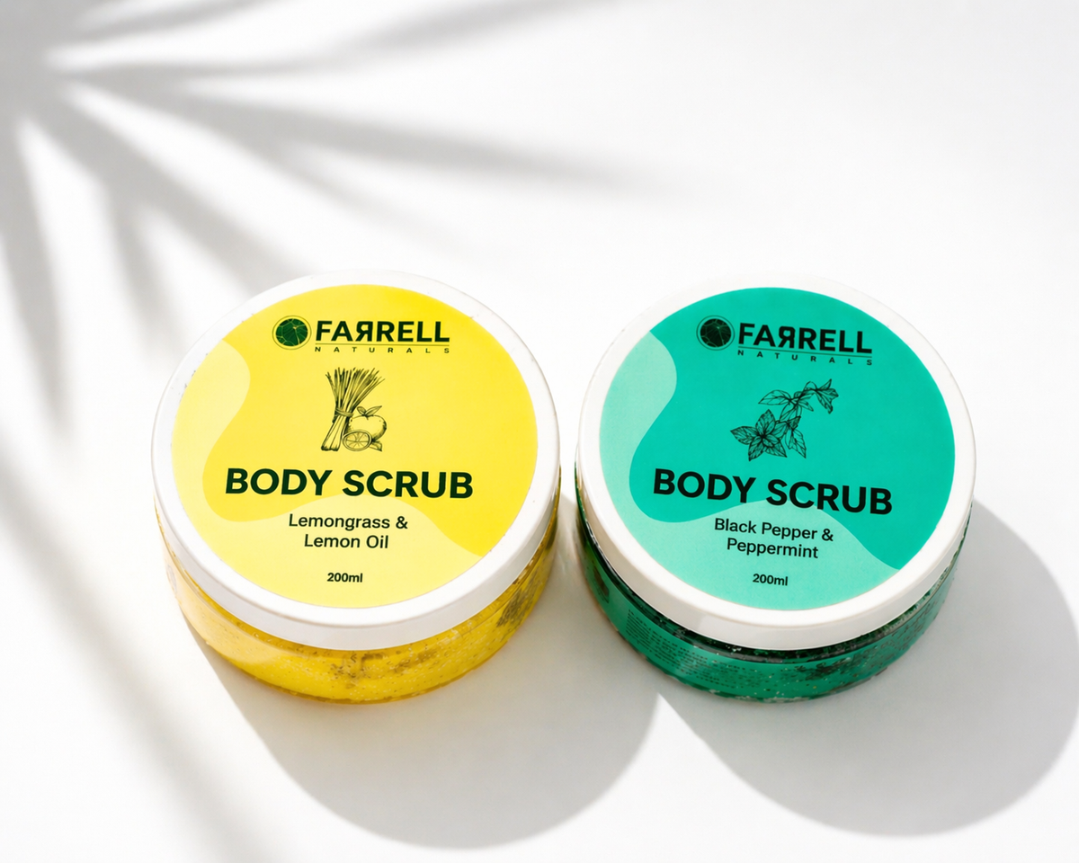 Two containers of Farrell Naturals body scrub, one yellow and one green, on a white background.